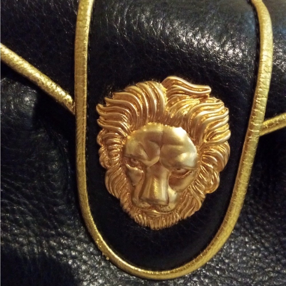 Dooney and Bourke Black and Gold Lion Emblem Clutch - Picture 2 of 8